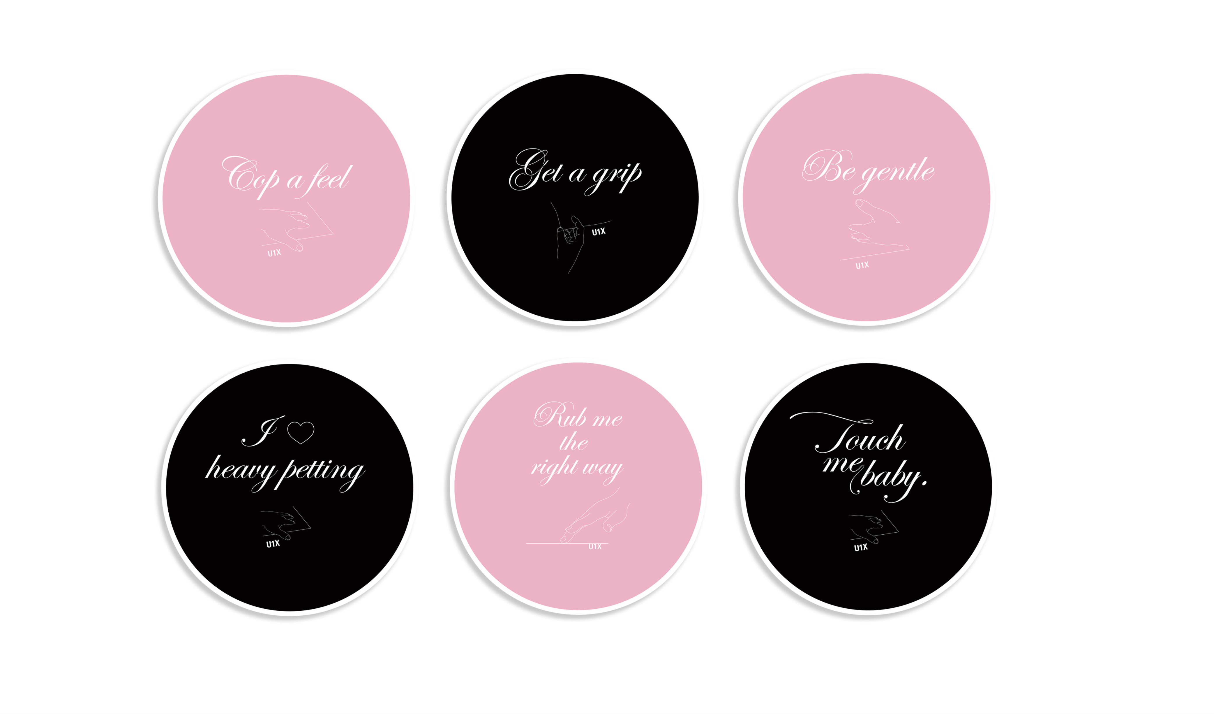Six different pink and black coasters with a message.